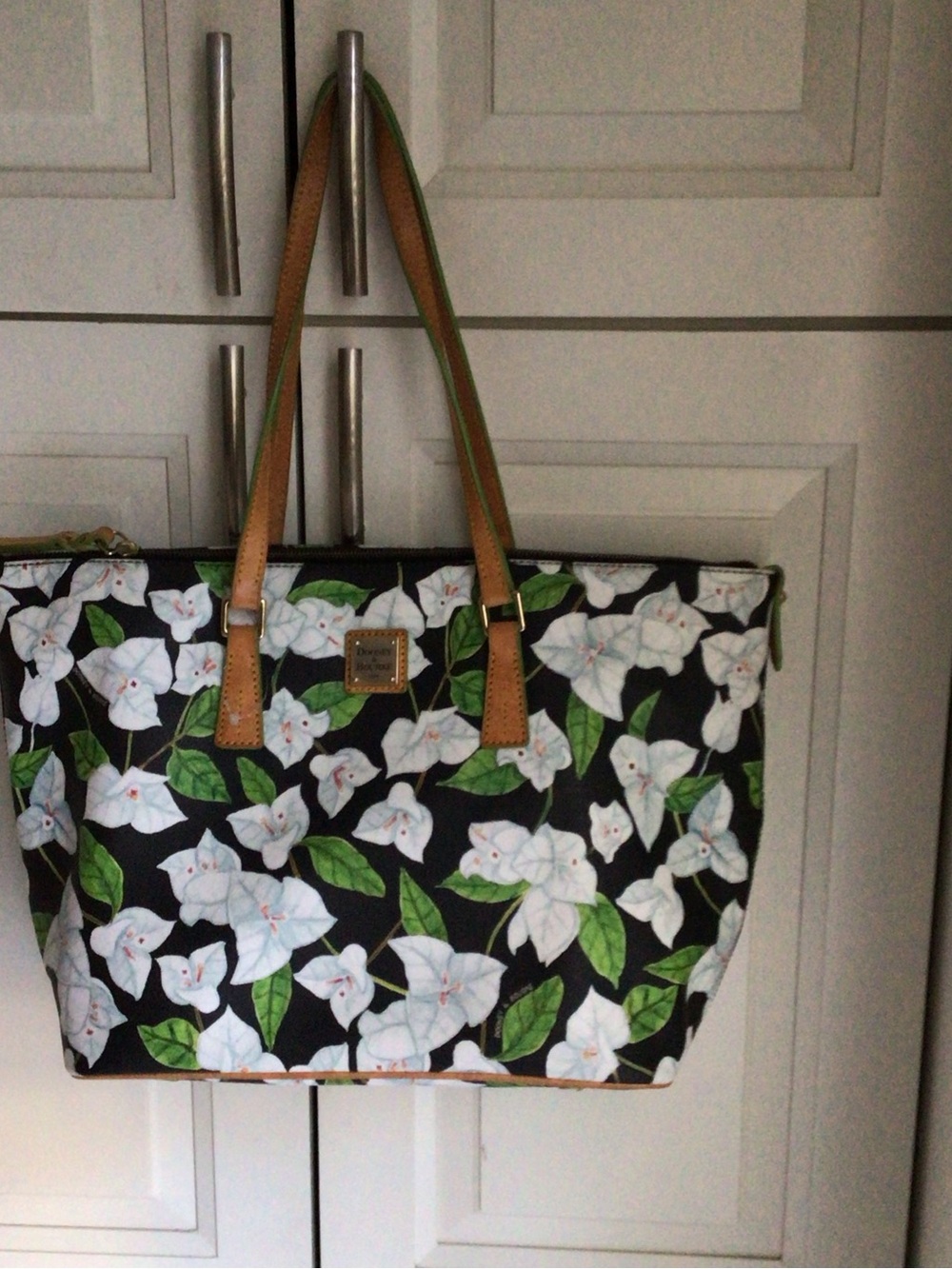 Dooney & Bourke Black Floral Tote with White Flowers and Green Leaves